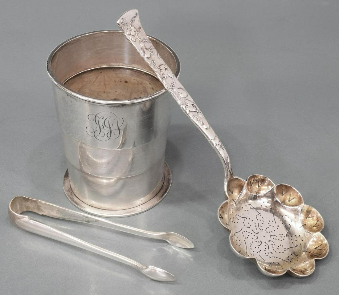 (3) TIFFANY & CO. STERLING SERVICE FLATWARE & CUP: (lot of 3) Tiffany & Co. sterling silver tableware, including: (1) collapsible cup, approx 3.25"h, 2.75"diam, (1) "Vine: Gourd" pierced serving spoon, approx 6.25"l, (1) "Faneuil" sugar tongs, approx 