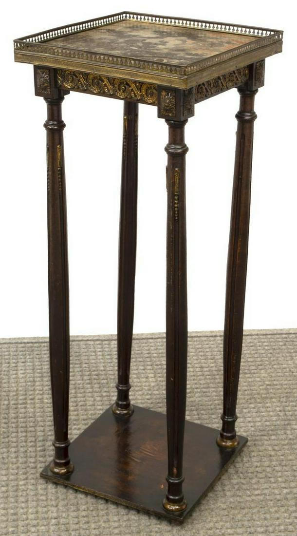 FRENCH LOUIS XVI STYLE MARBLE-TOP STAND: French Louis XVI style marble-top stand, early 20th c., in a mahogany finish, accented throughout with gilt metal beading, scrollwork and foliate motifs, the marble top wrapped in a pierced gilt metal