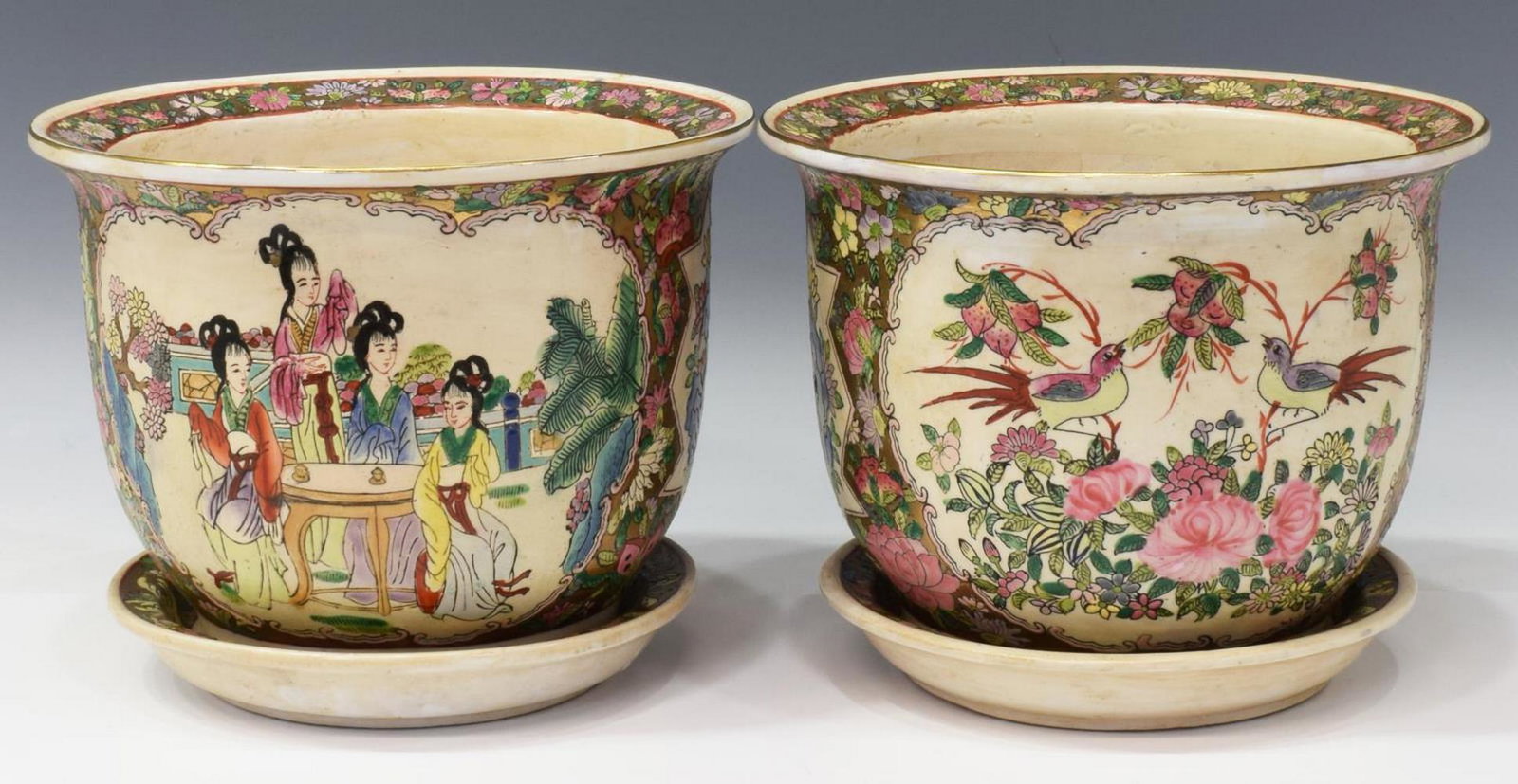 (2) CHINESE DECORATED PLANTER POTS: (pair) Chinese ceramic planter pots, each with floral decorated rim, central figural design surrounded with flowers, foliate, and scroll work highlights, accompanied by corresponding underplates, hair
