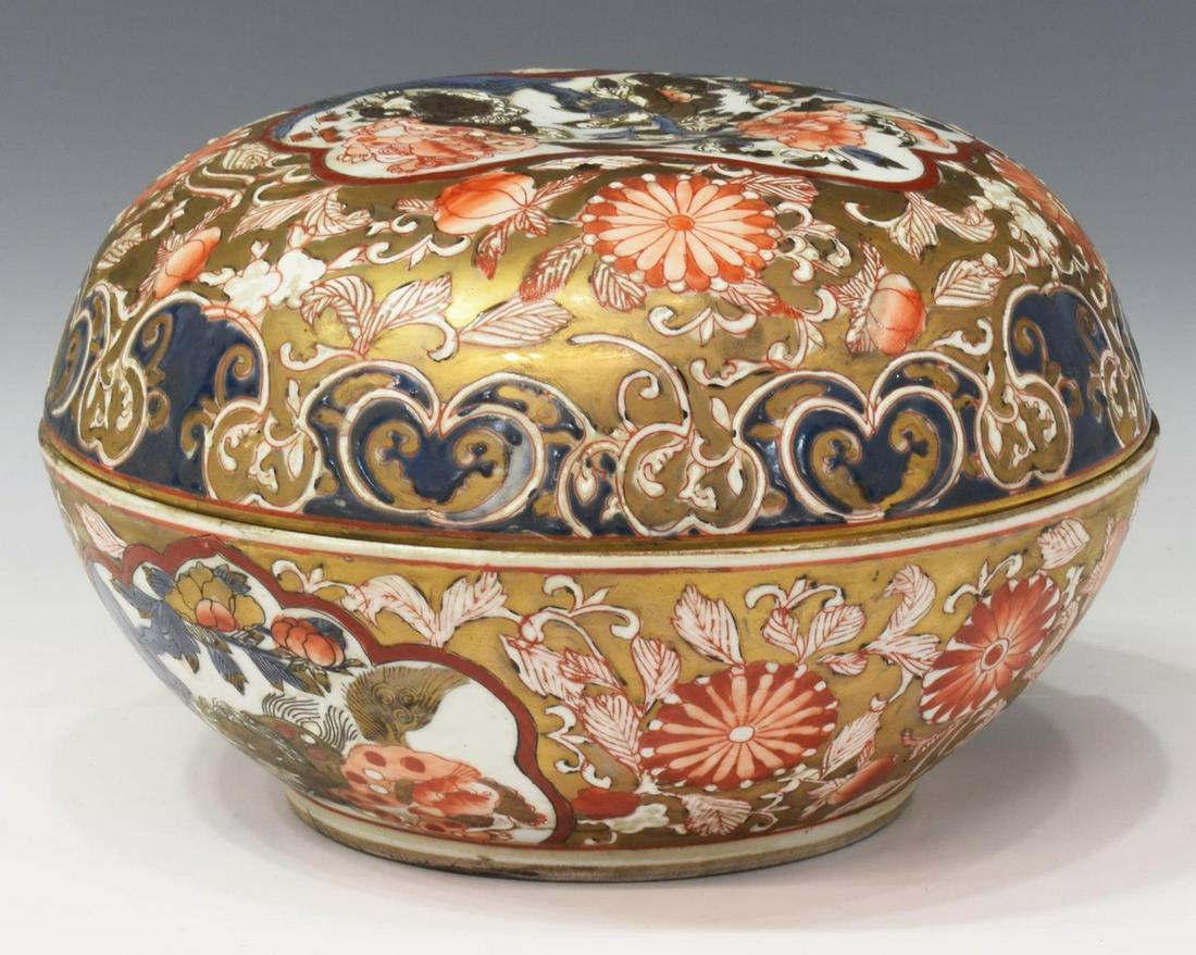 CHINESE IMAN DESIGN PORCELAIN COVERED BOX: Chinese Iman design porcelain covered box, with dome shaped lid, all in a gold gilt finish with scroll, floral and foliate decoration, marked underfoot, approx 7"h, 11"diam, 6.5lbs Start Price: $50.00