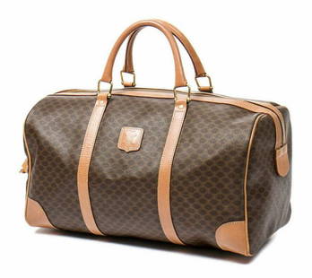 CELINE 'WEEKENDER' MACADAM CANVAS TRAVEL BAG: Celine "Weekender" travel bag, in brown and tan Macadam coated canvas, with gold-tone hardware, brown leather trim, dual rolled handles, zipper closure at top opening to brown canvas lined interior,