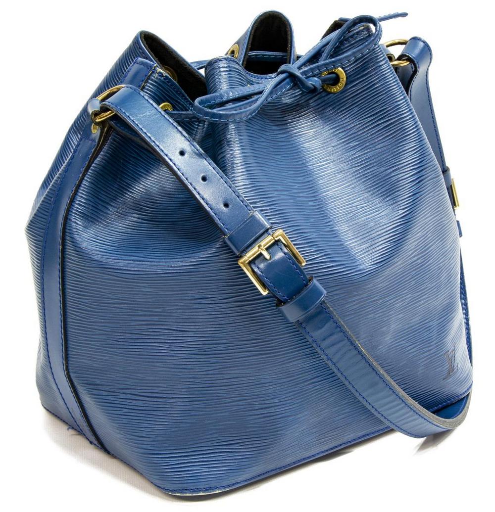 LOUIS VUITTON 'NOE PM' BLUE EPI LEATHER BUCKET BAG: Louis Vuitton "Noe PM" bucket bag, in blue Epi leather, with brass hardware, adjustable flat shoulder strap, drawstring closure at front face, creasing to the leather, measurements for shipping purpos