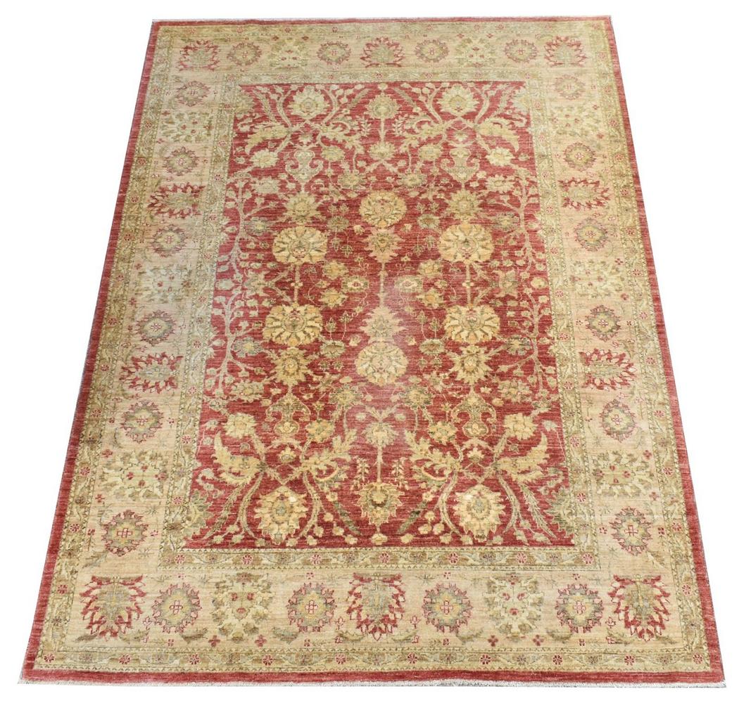 HAND-TIED FLORAL PESHAWAR RUG, 8'10" X 6'4": Hand-tied Peshawar rug, red ground and beige border, floral motifs throughout, approx 8'10"l, 6'4"w **Provenance: from a very fine San Antonio, Texas estate** Start Price: $150.00