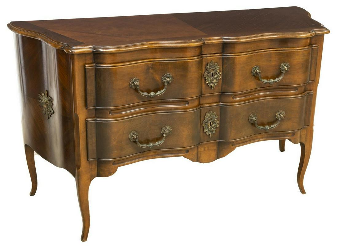 FRENCH LOUIS XV STYLE FRUITWOOD COMMODE: French Louis XV style fruitwood commode, early 20th c., having serpentine shaped top and case, fitted with two drawers, rising on cabriole legs, approx 31.5"h, 55"w, 20.25"d Start Price: $200.00