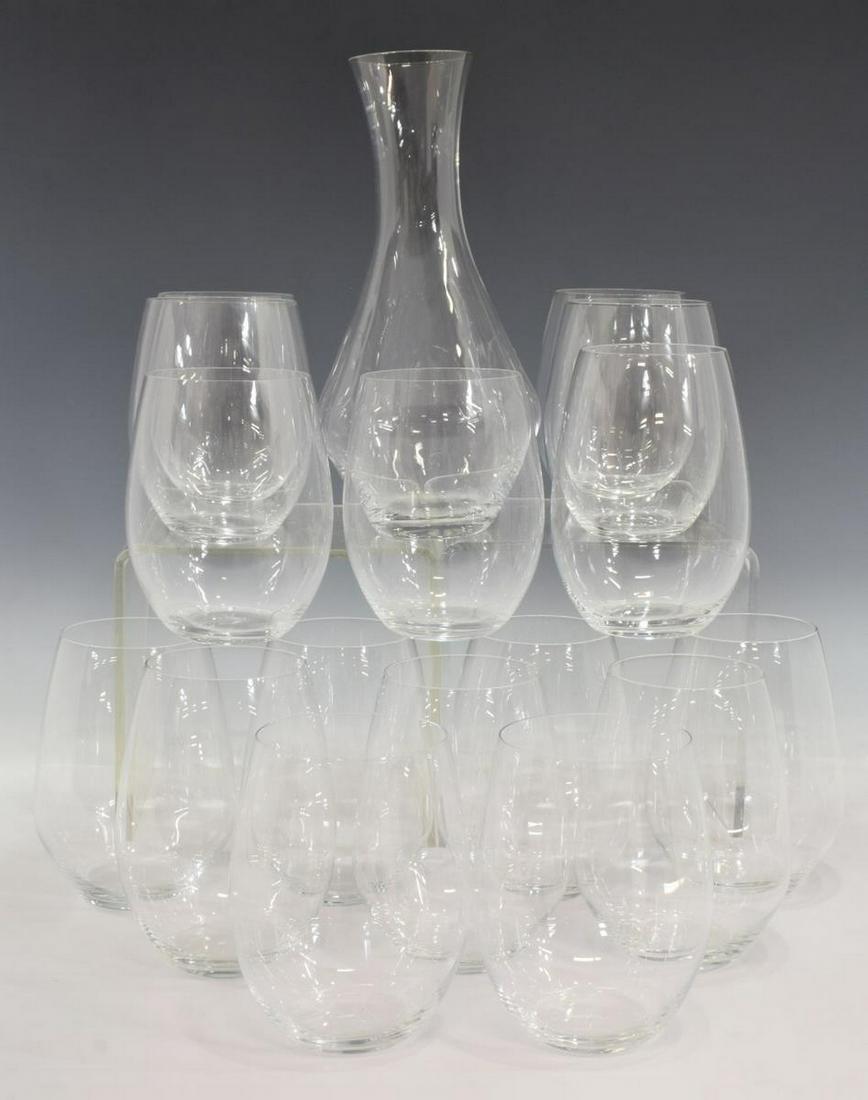 (17) RIEDEL 'O' COLORLESS STEMLESS WINE GLASSES: (lot of 17) Riedel "O" colorless stemless wine glasses, including: (8) Syrah, approx 5.25"h, (8) Cabernet, approx 4 7/8"h, (1) open carafe/ decanter, approx 9.5"h; 5lbs total Start Price: $100.00
