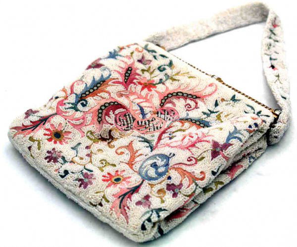 FINELY BEADED VINTAGE CREWEL WORK PURSE / HANDBAG: Finely beaded vintage purse with multi color crewel work flowering vines on the beaded handle and body, the gilt frame encrusted with clear rhinestones, yellow sateen interior, minor loss of stones, l
