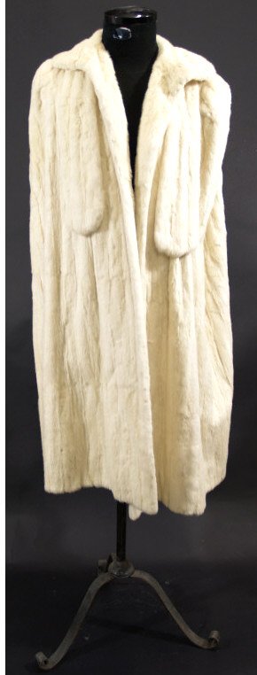 VINTAGE LADIES DESIGNER BERGDORF GOODMAN FUR CAPE: Vintage Designer ladies ermine cape with collar, circa 1950's-1960's, tag barley attached, reading Bergdorf Goodman, Fifth Ave at 58th St., 43"l