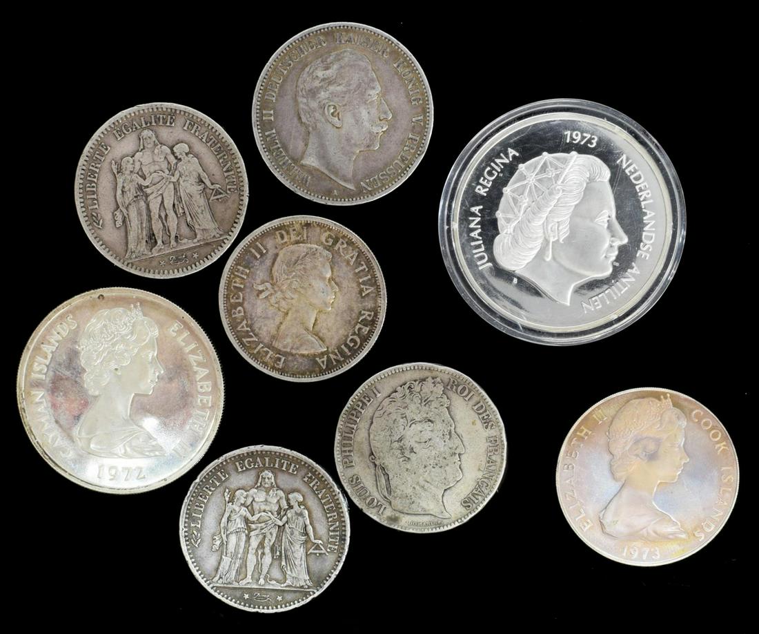 (8) WORLD SILVER COINS, APPROX. 7.91 OZT: (lot of 8) World silver coins: (1) Cayman Islands, 1972, Twenty-Five Dollars, Elizabeth II silver wedding anniversary; (1) Netherlands1973, Twenty-Five Guilders; (1) Cook Islands, 1973, Elizabeth II, 