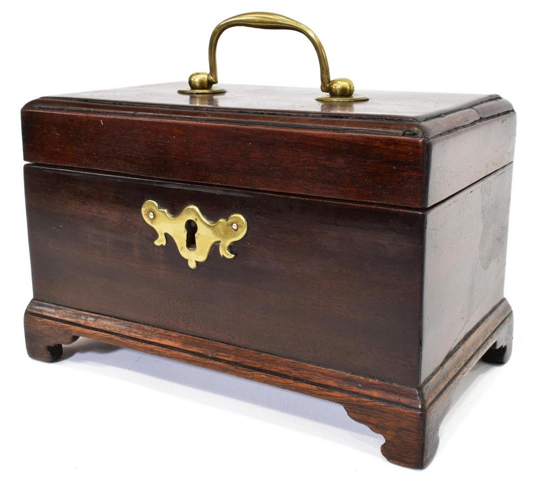 ENGLISH CHIPPENDALE PERIOD MAHOGANY TEA CADDY: English Chippendale period mahogany tea caddy, 18th c., the rectangular top with brass handle, opening to divided interior, bat wing escutcheon on the facade, rising on bracket feet, approx 4.25"h, 6.