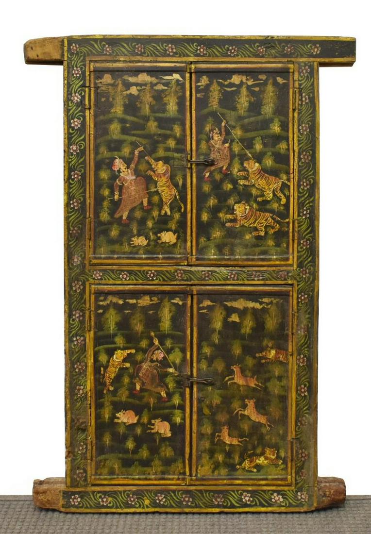 POLYCHROME WOOD WINDOW PAINTED HUNTERS & TIGERS: Polychrome wood window frame, India, 19th c., having two pair of shutters with later figural and fauna painted scenes depicting a Mughal hunter with spear fighting a tiger, the perimeter with foliate 