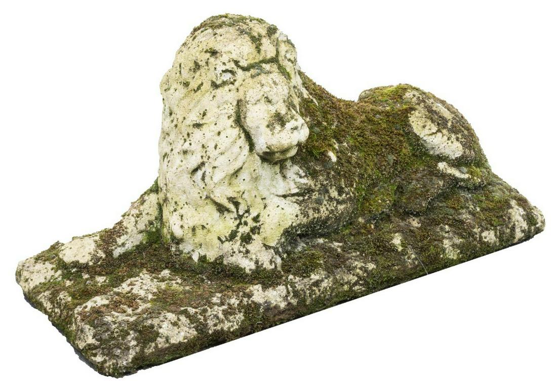 GARDEN STATUARY CAST STONE RECLINING LION: Cast stone reclining lion, mid 20th c., covered in garden foliage, approx 14.5"h, 30"w, 13"d Start Price: $150.00