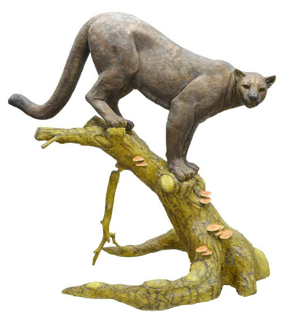 JACOB DAGAN 5/20 LIFE-SIZE MOUNTAIN LION BRONZE: Life-size patinated and painted bronze wildlife figure, Mountain Lion, by Jacob Dagan, numbered 5/20, dated 2015, the large cat perched upon a naturalistic tree trunk, rear dangling branch intact with
