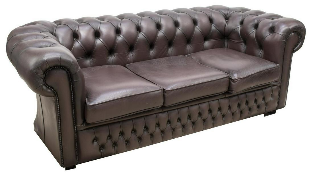 ENGLISH CHESTERFIELD BUTTONED LEATHER SOFA: English Chesterfield brown leather sofa, late 20th c., button-tufted rolled back, with nail head trim, three seat cushions, approx 28"h, 74"w, 33"d Start Price: $400.00