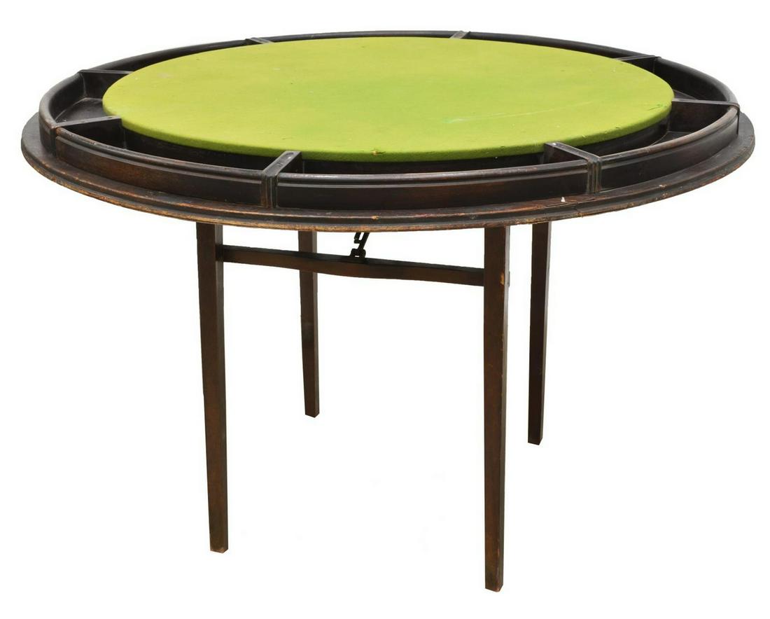 VINTAGE FELT-TOP POKER GAMES TABLE: Vintage poker table, circular tabletop with inset green felt playing surface, wells for chips, rising on folding base with tapered legs, approx 30.5"h, 47.5"diam Start Price: $50.00