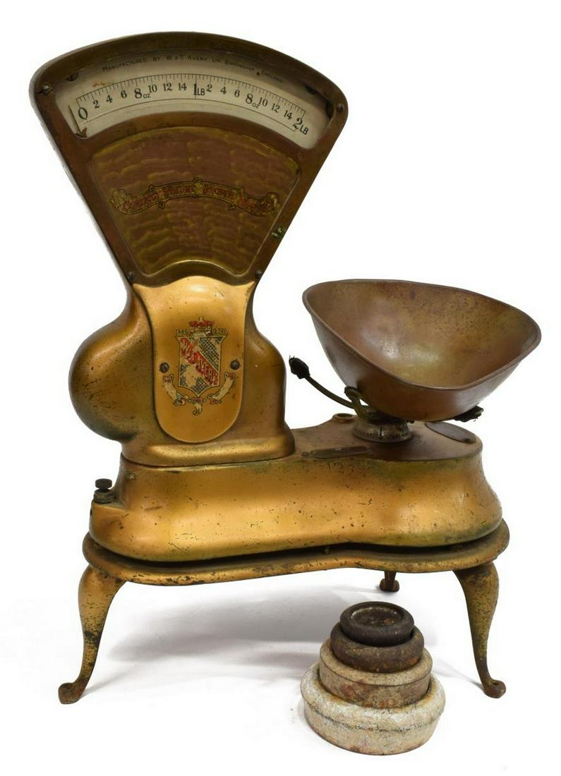AVERY-TOLEDO GILT PAINTED SCALES, EARLY 20TH C.: English Avery-Toledo scales, No. 396594, early 20th c., painted iron and metal frame with remnants of gilding, accompanied by assorted weights, not operating, approx 20"h, 14.5"w, 7"d, 30lbs Start Pri