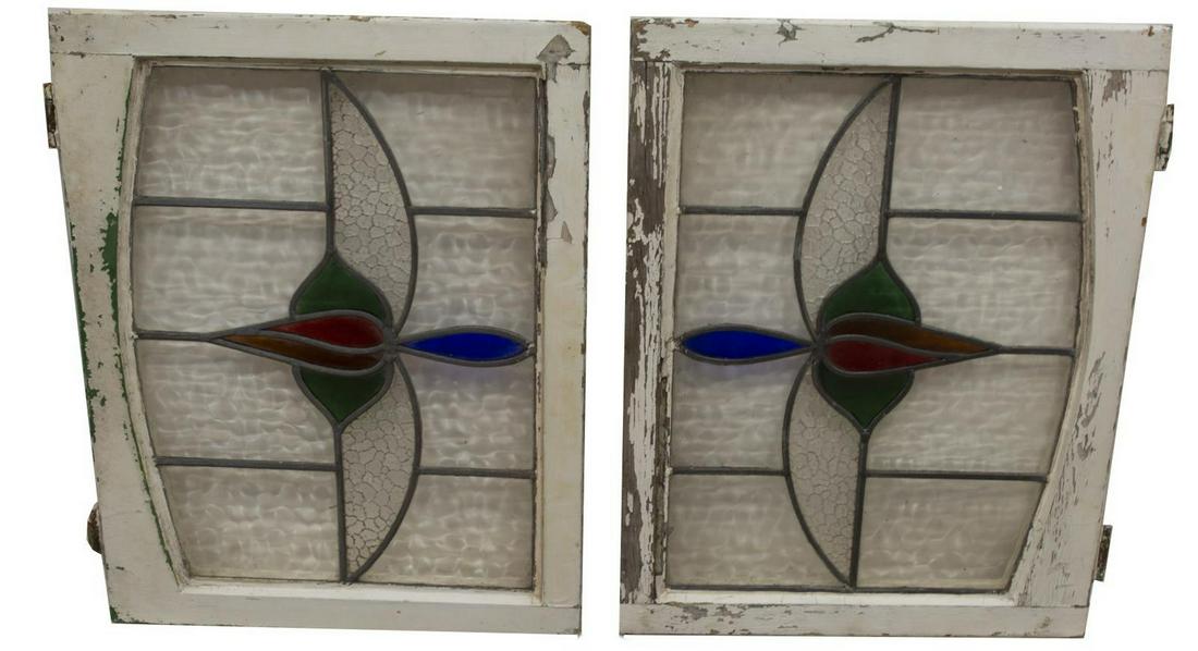 (2) ENGLISH STAINED & LEADED GLASS WINDOWS: (lot of 2) English stained glass windows, early 20th c., each in white painted frame encasing leaded plate with clear and colored glass, loss to paint, sizes varied slightly, largest: approx 27.5"h, 2