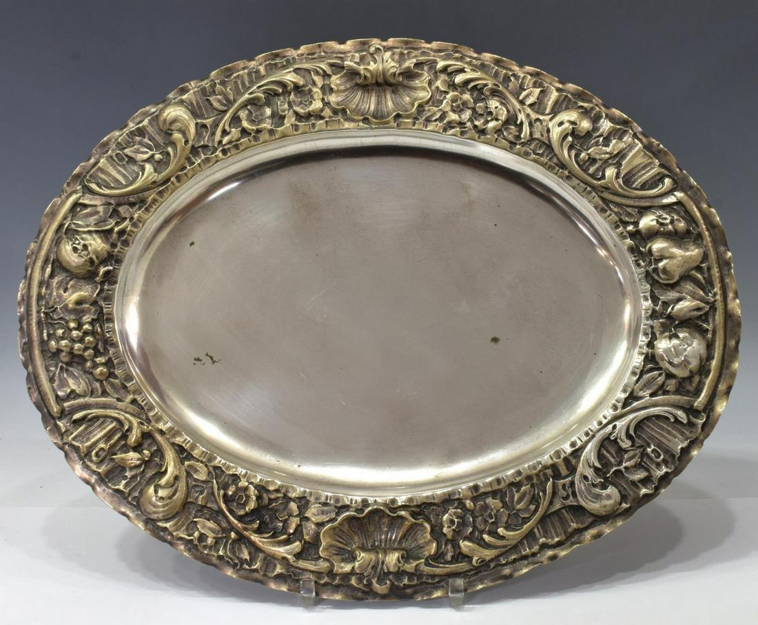 ITALIAN 800 SILVER FRUIT BORDER SERVING TRAY: Italian 800 silver serving tray, oval form, repousse border with shells, scrolling foliates, and fruit, stamped 800, approx 17.5"l, 14"w, 37.00ozt Start Price: $300.00