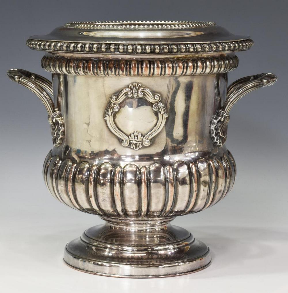 SHEFFIELD PLATE CAMPAGNA FORM BOTTLE COOLER: Sheffield plate champagne / wine bottle cooler of campagna form, 19thc., beaded and ribbed , with removable rim and interior liner, open cartouche to either side, flanked by flared handles, marked H u