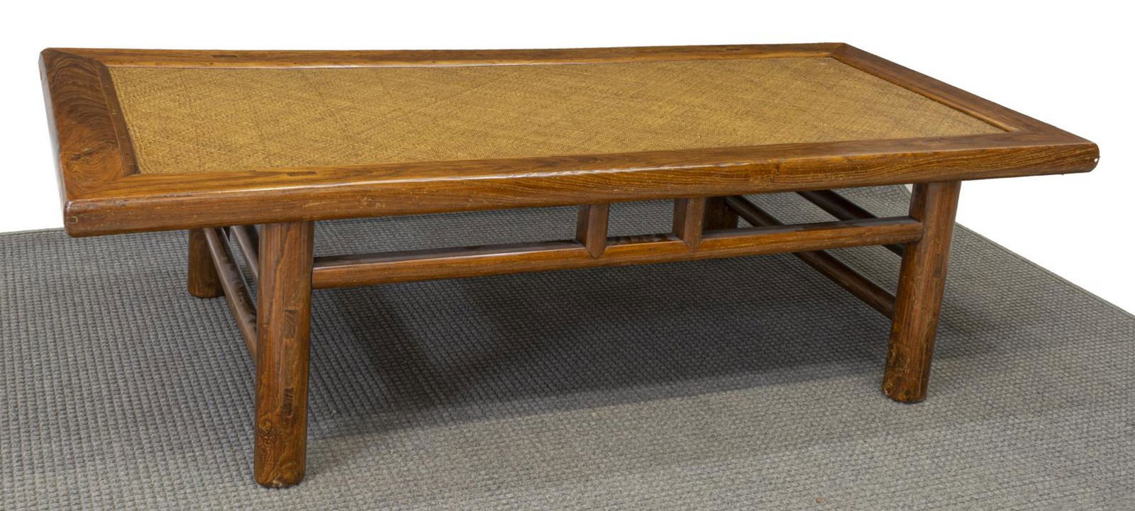 CHINESE RATTAN & ELMWOOD BED, 19TH C.,: Chinese elmwood framed bed, 19th c., the center with woven rattan, rising on stretcher joined turned supports, 22.5"h, 81.5"w, 38"s Start Price: $150.00