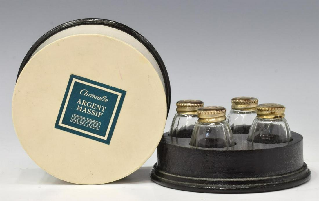 (8) FRENCH CHRISTOFLE STERLING LID SALT SHAKERS: (lot of 8) French Christofle salt shakers, pierced sterling silver lids over molded glass base, housed in two branded boxes, shaker: approx 1.5"h, box: approx 2"h, 4"diam; 0.75lbs total (for shipping