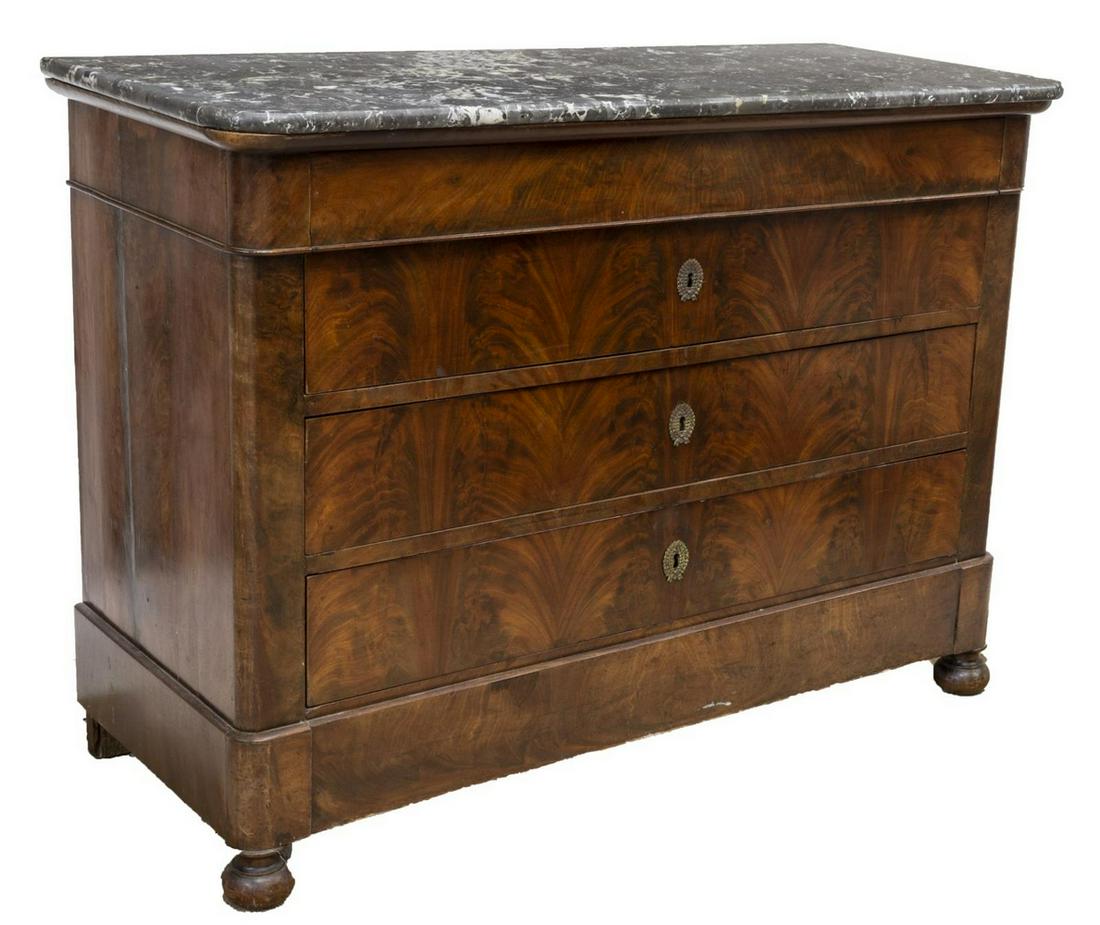 FRENCH MARBLE-TOP MAHOGANY FOUR-DRAWER COMMODE: French marble-top mahogany commode, 19th c., with four drawers, rising on turned feet, approx 36.25"h, 50"w, 21"d Start Price: $400.00