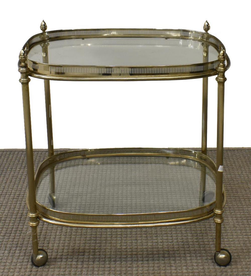 FRENCH SILVER-TONE METAL TRAY-TOP SERVICE BAR CART: French silver-tone metal service bar cart, mid to late 20th c., two colorless glass tiers with pierced metal galleries, removable tray top, fluted vertical supports, on wheels, approx 27.5"h, 25.75"w,