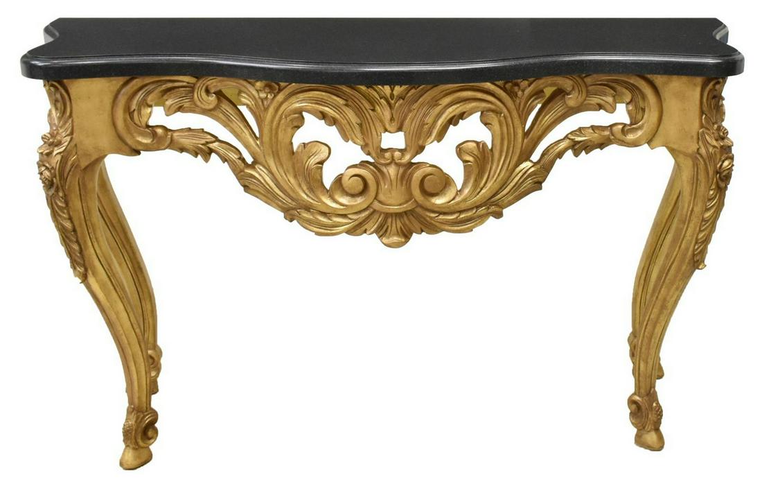 FRENCH STYLE GILT CONSOLE TABLE: French style console table, late 20th c., shaped faux granite top, over gilt frame with scrolling foliate apron, rising on cabriole legs, ending in hoof feet, approx 33.5"h, 56.5"w, 18.75"d **Provenan