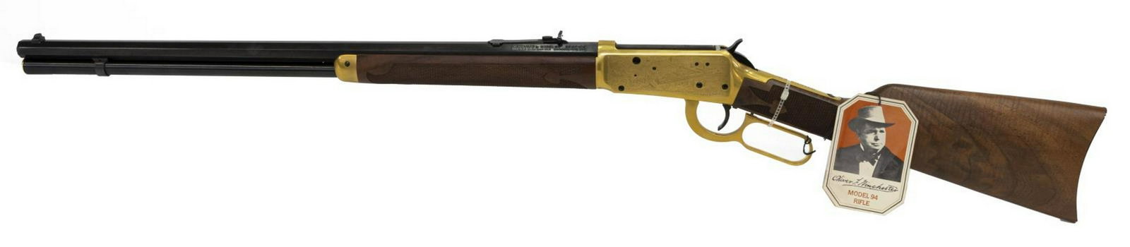 O.F. WINCHESTER COMMEMORATIVE 1894 RIFLE, 38-55: Winchester Model 1894 Oliver F. Winchester commemorative rifle, 38.55 caliber, lever action, 24" octagonal barrel, buckhorn rear sight, figural and scenic engraved gilt receiver, the walnut butt stock