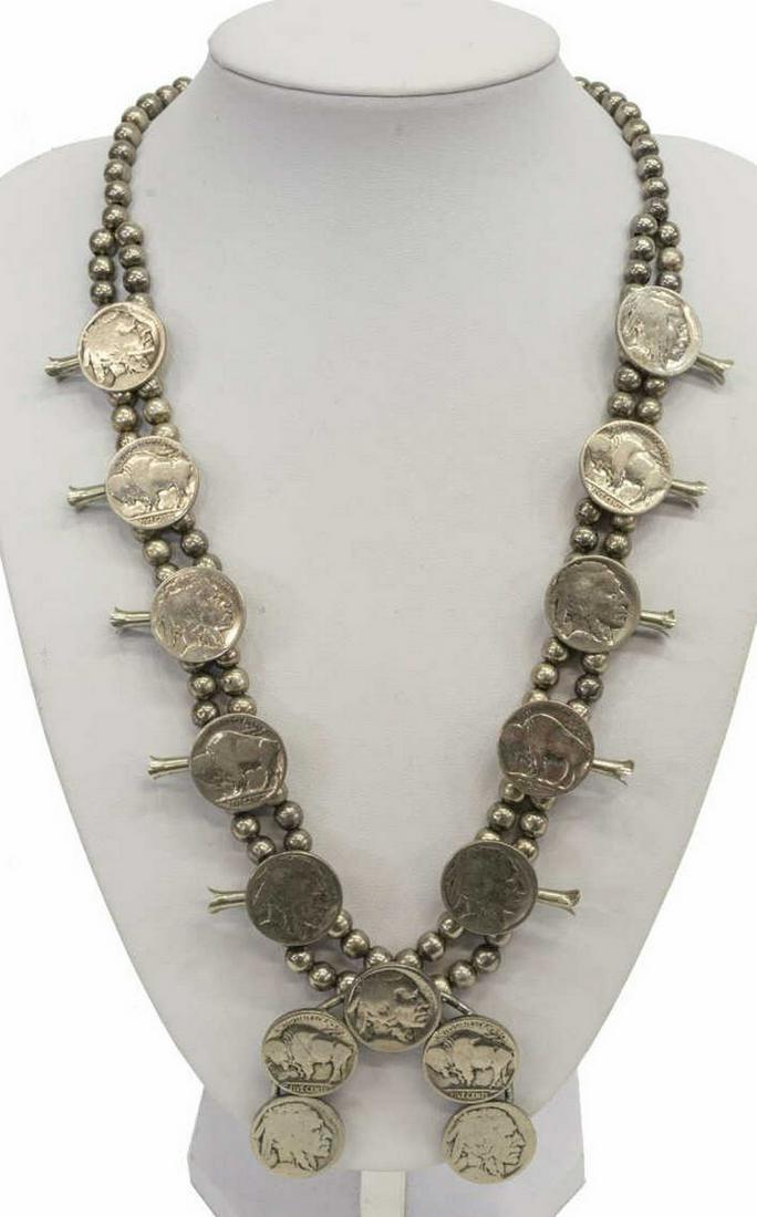 NATIVE AMERICAN BUFFALO NICKEL SQUASH BLOSSOM: Native American Indian Head / Buffalo nickel squash blossom necklace, fashioned with silver (content unknown) bench beads and mounted with (10) blossoms surmounted by alternating coins, central naja f