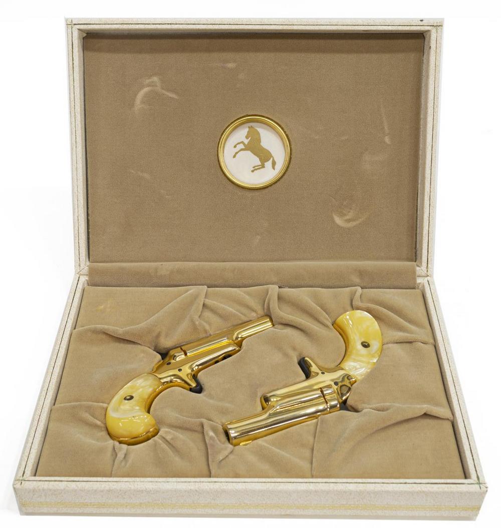 (PAIR) BOXED COLT LADY DERINGER GOLD & MOP PISTOLS: (pair) Colt Lady Deringer pistols, .22S caliber single shot, 2.25" round swivel rifled barrels, gilt finish, mother of pearl grips, housed in Colt box, consecutive serial numbers, SN 7XXXDER, *REQUIRE