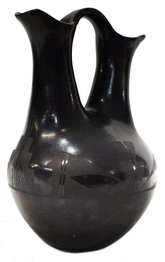 MARIE MARTINEZ SAN ILDEFONSO PUEBLO WEDDING VASE: Native American black on black pottery wedding vase, signed on underside Marie (Marie "Maria" Montoya Martinez, 1887-1980), San Ildefonso Pueblo, c.1920-1925, with repeated geometric motif, approx 10.