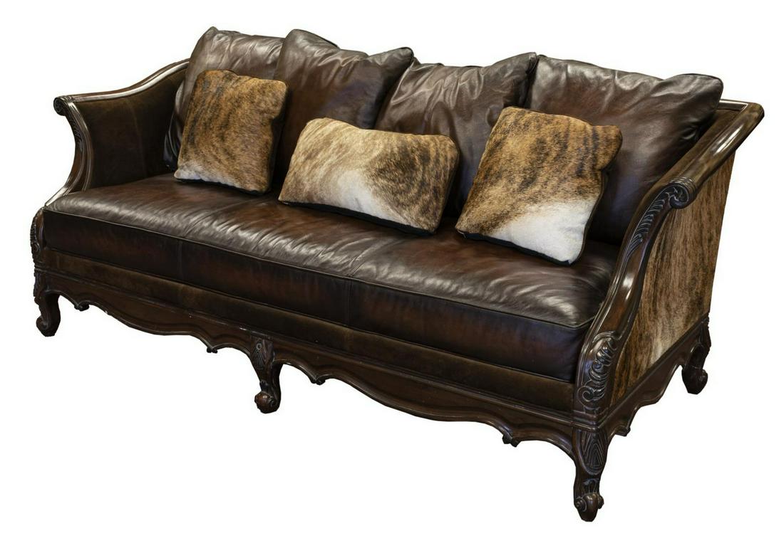 BERNHARDT LEATHER, COWHIDE & SUEDE SOFA: Bernhardt leather and cowhide sofa, having suede back and interior sides, brown cowhide to rear and exterior sides, fitted with (one) large leather seat cushion, (four) leather back cushions, (two) sm