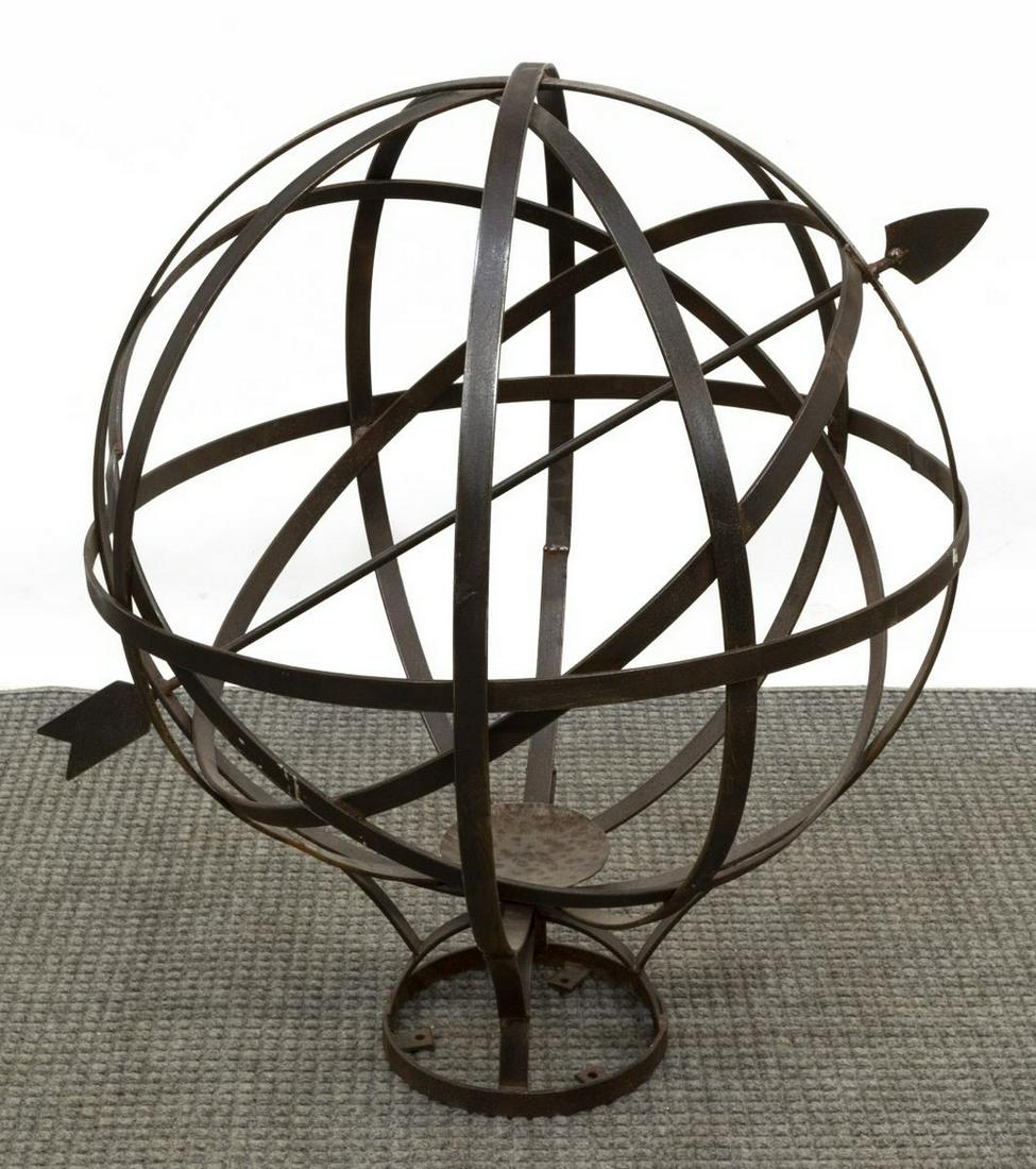 LARGE ARCHITECTURAL IRON ARMILLARY SPHERE, 35"H: Large architectural iron armillary sphere, 20th c., large sphere comprised of iron straps, with transverse arrow, rising on a circular base, approx 35"h, 29"diam Start Price: $150.00
