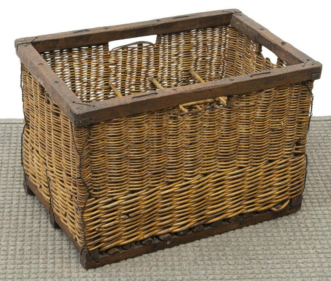 FRENCH WICKER 15 BOTTLE WINE CARRIER/BASKET: French wicker wine bottle carrier/ basket, early 20th c., rectangular form with recessed handles, holds up to fifteen bottles, approx 15.5"h, 23"w, 15"d Start Price: $150.00