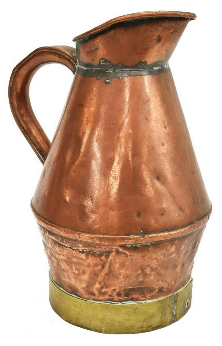 FRENCH ALSATIAN COPPER WINE/HARVEST JUG: French Alsatian copper wine/ harvest jug, initialed E.B. on foot, side handle, with hammering along bottom, approx 11"h, 1.8lbs Start Price: $80.00