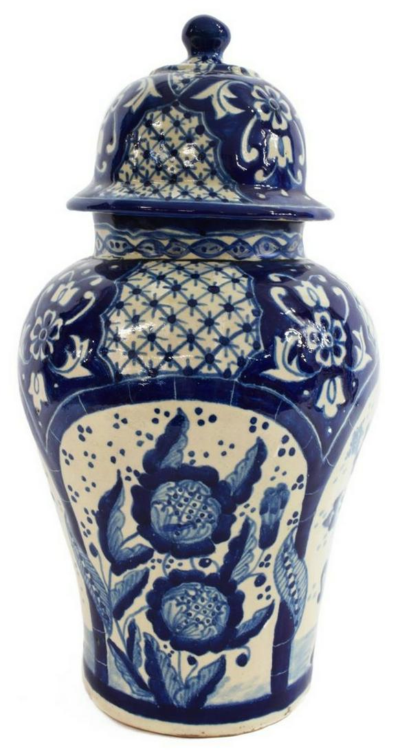 TALAVERA TIN-GLAZED EARTHENWARE LIDDED URN, MEXICO: Uriarte Talavera blue and white tin-glazed lidded urn, Mexico, 20th c., neck widening to tapered body, painted floral design throughout, mark on foot as pictured, approx 17"h, 6"diam, 9lbs Start Price