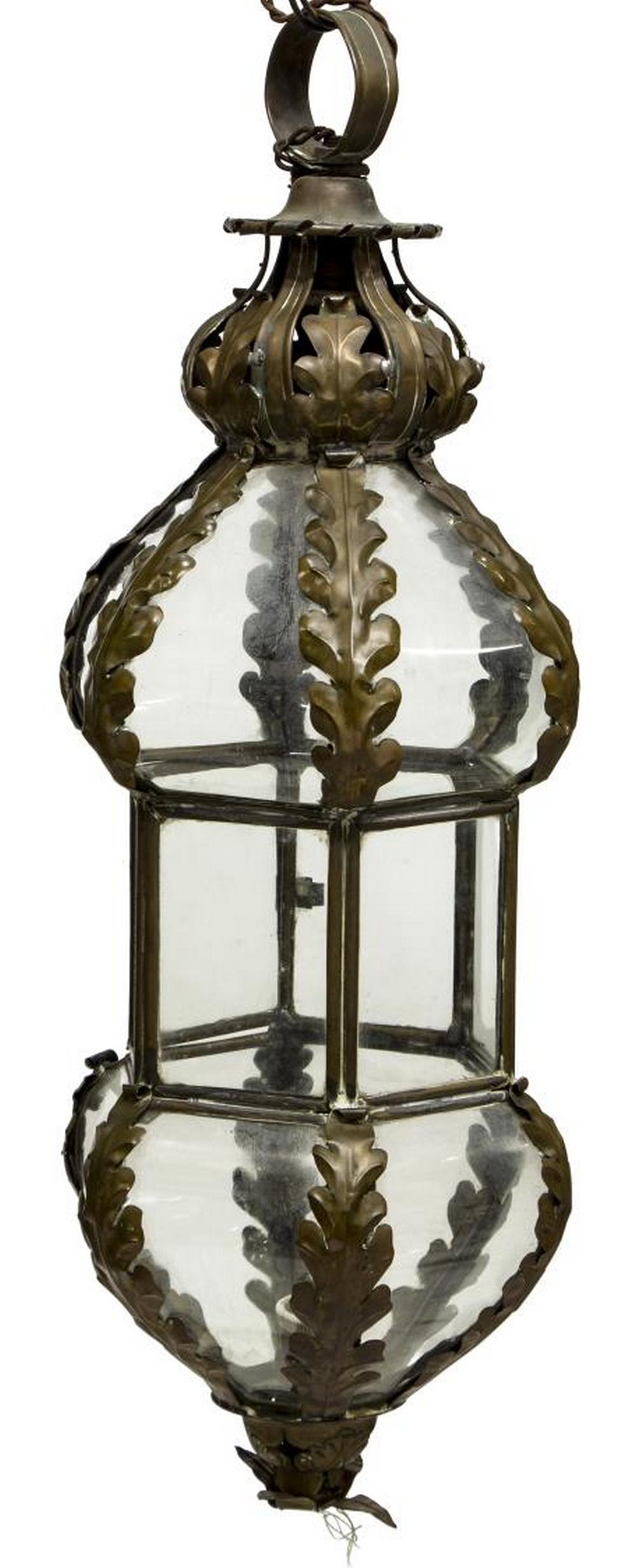 FRENCH ACANTHUS LEAF GLASS 1-LIGHT HANGING LANTERN: French shaped hanging lantern, 20thc., the acanthus leaf frame holding glass panes, central interior single light, in need of wiring, approx 29"h, 11"w Start Price: $20.00