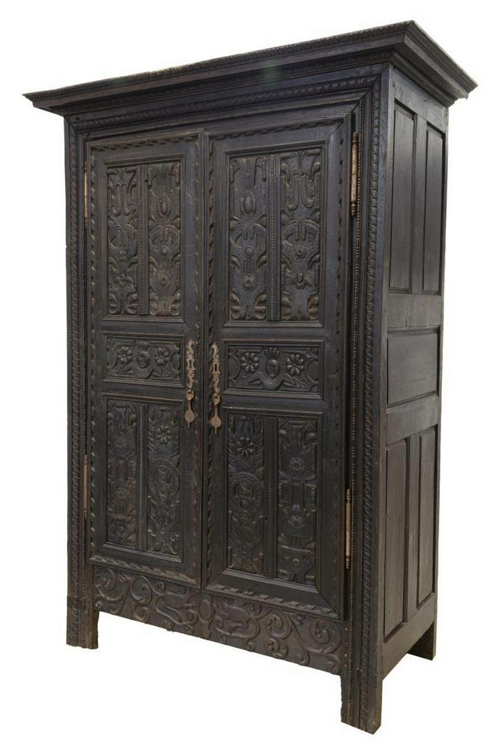 CONTINENTAL EBONIZED CARVED OAK ARMIORE, 18TH C. (1 of 8)