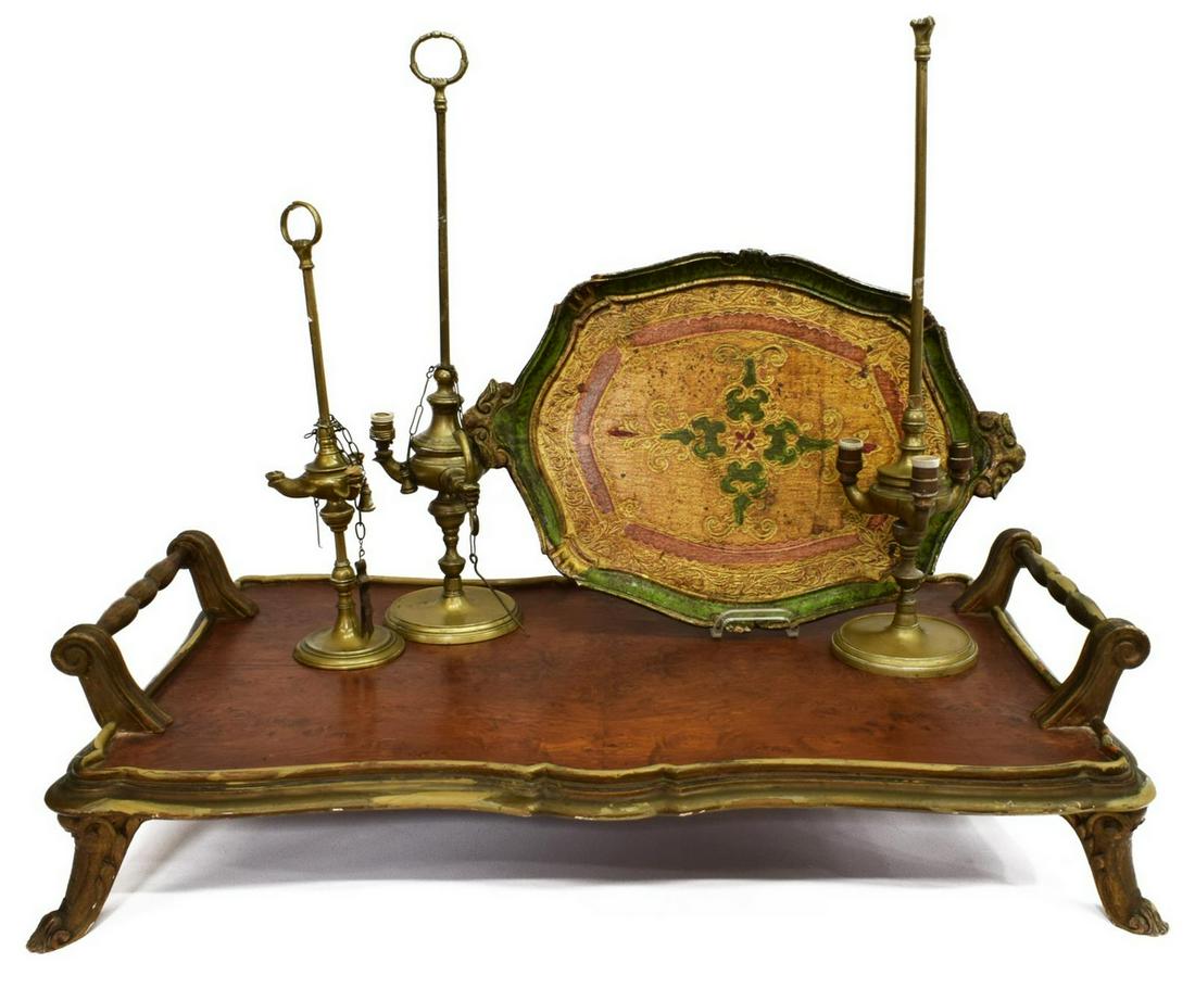 5) CONTINENTAL TABLE ITEMS, WHALE OIL LAMPS, TRAYS: (lot of 5) Collection of table items: (2) brass whale oil lamps, two electrified (in need of wiring), largest: 20.5"h; (2) trays, (one) Florentine gilt painted tray, (one) large burlwood tray with han