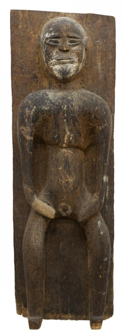 AFRICAN BAMILEKE WOODEN FIGURE HEALING PIECE: African Bamileke wooden figure healing piece, reclining form caved on rectangular panel, with closed eyes, still features, arms and legs extending downward, block feet, wall mount verso, patina and lo