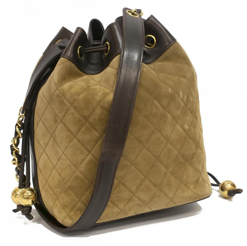 VINTAGE CHANEL QUILTED SUEDE DRAWSTRING BUCKET BAG (1 of 4)
