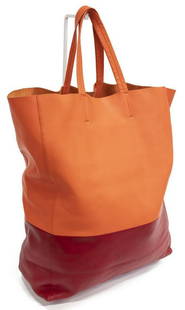 CELINE 'VERTICAL CABAS' BICOLOR LEATHER TOTE BAG: Celine "Vertical Cabas" tote bag, from a Phoebe Philo collection, in bicolor orange and burgundy smooth calfskin leather, with gold-tone hardware, foil-stamped logo at front, dual flat handles, open t