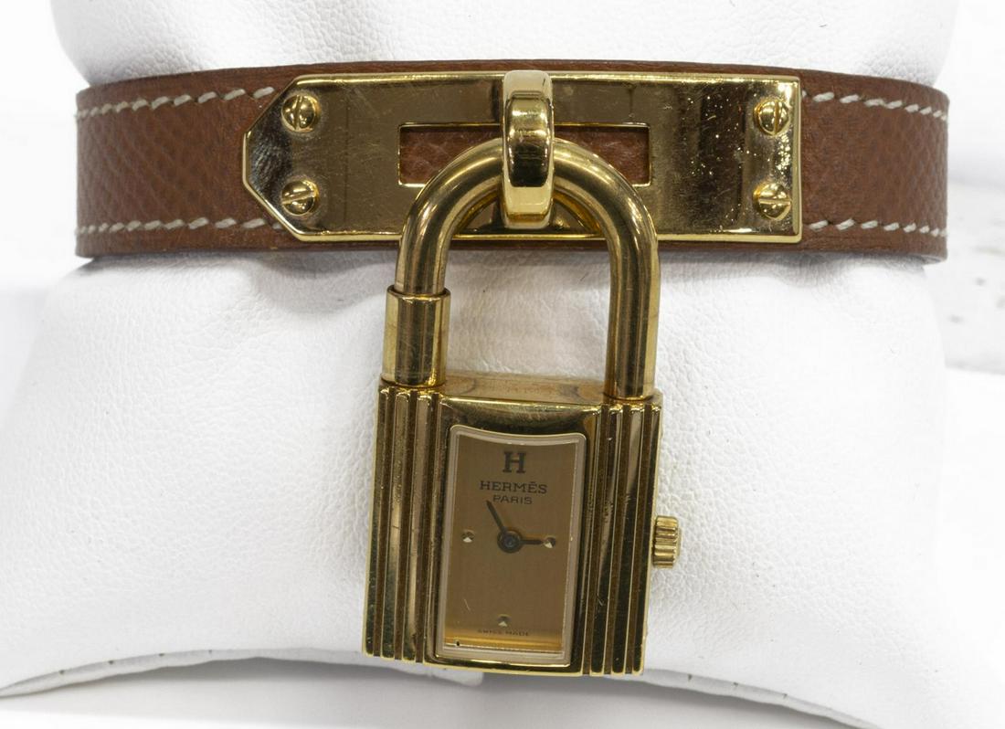 HERMES 'KELLY' LOCK WATCH ON BROWN LEATHER STRAP (1 of 3)