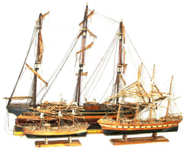 GROUP OF VINTAGE SPAIN SHIPS MODELS ON STANDS: (lot of 4) Group of vintage wooden ship models, each mounted on a stand, including: the largest with plaque reading "The Fragata Espanola Ano 1870", polychrome decorated with gilt accents, 30.5"h, 40"