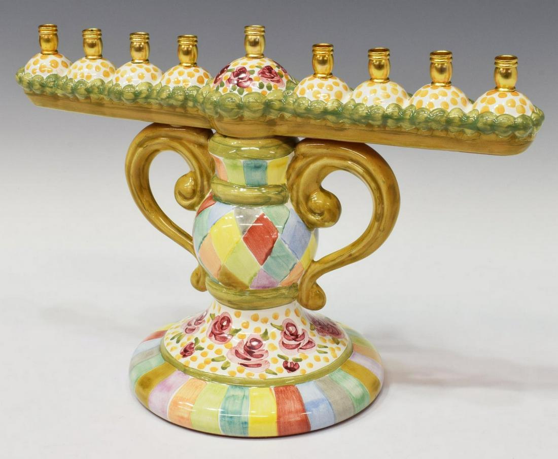 MACKENZIE-CHILDS 'DORI' PATTERN CERAMIC MENORAH: Mackenzie-Childs ceramic menorah, in the "Dori" pattern, having nine candle holders, scrolled handles, on a domed base, approx 9"h, 12.5"w, 6"d, 3.25lbs Start Price: $150.00
