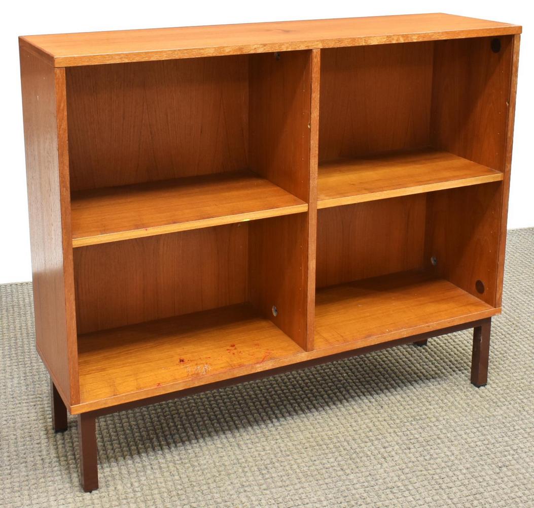 DANISH MID-CENTURY MODERN TEAK BOOKCASE: Danish mid-century modern teak bookcase, c.1950s, adjustable height shelves, rising on squared metal legs, approx 36"h, 43"w, 12"d Start Price: $100.00