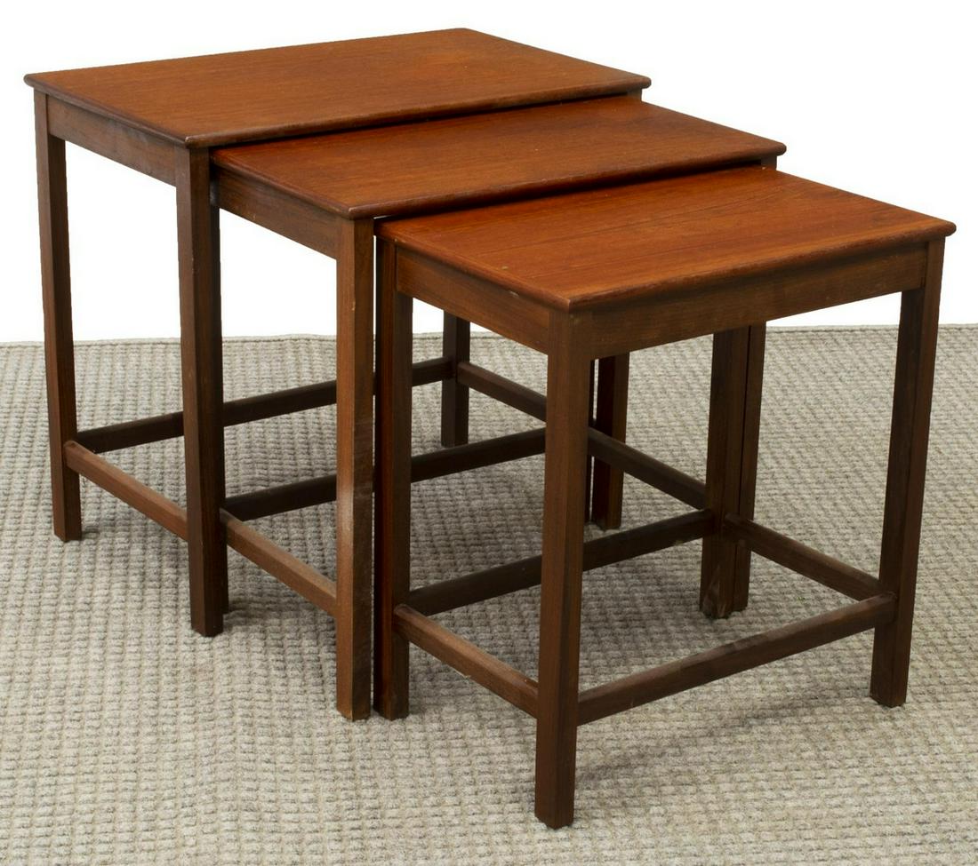 DANISH MID-CENTURY MODERN TEAK NESTING TABLES: Danish mid-century modern teak nesting tables, c.1950s, each of graduated size with rectangular top, rising on straight legs, largest: approx 20"h, 21.5"w, 13.5"d, smallest: approx 18.25"h, 17"w, 11"d