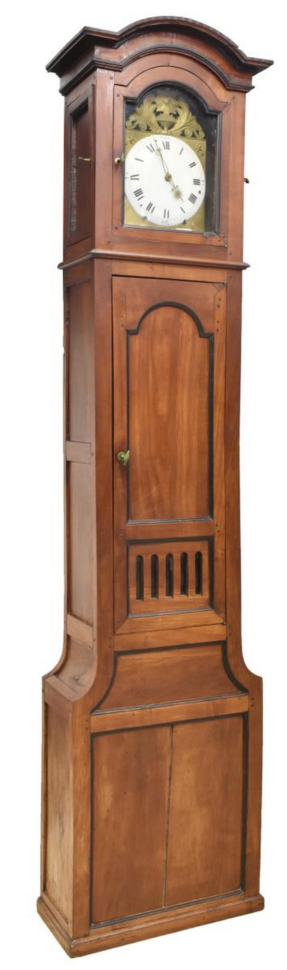 FRENCH LOUIS PHILIPPE STANDING LONG CASE CLOCK: French Louis Philippe morbier standing longcase clock, 19th c., having fruitwood case, glazed dial window, housing gilt metal repousse frame depicting starburst backed mask above urn flanked by foliag