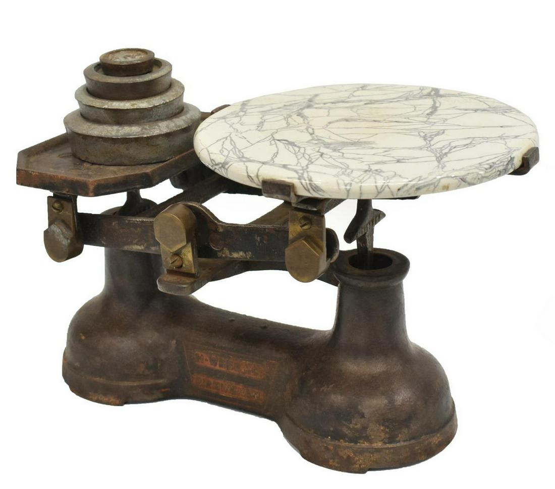 ENGLISH H. WEBB & CO METAL SCALE WITH WEIGHTS: English painted iron and metal scale, H. Webb & Co of Birmingham, marbleized porcelain plate, retains 2 oz, 8 oz, 1 lb., and 2 lb. weights, approx 8.25"h, 12"w, 8.5"d, 16.25lbs Start Price: $80.00