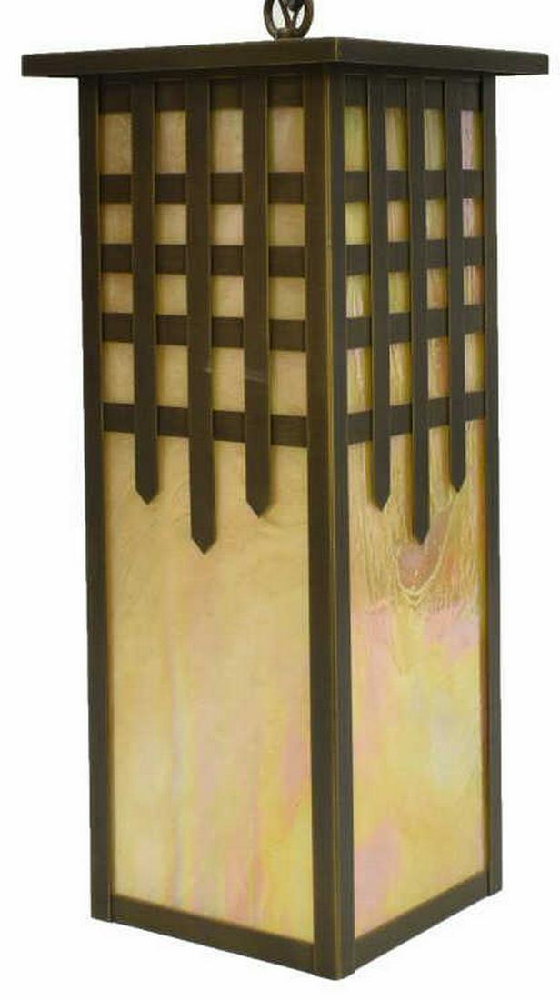 ARTS & CRAFTS CASTLE GATE HANGING PENDANT LIGHT: Arts and Crafts style hanging pendant light, Brass Light Gallery, Milwaukee, in "Castle Gate" pattern, having one interior light, iridescent slag glass panes, in metal frame, approx 18.25"h, 8"w, 8"d,